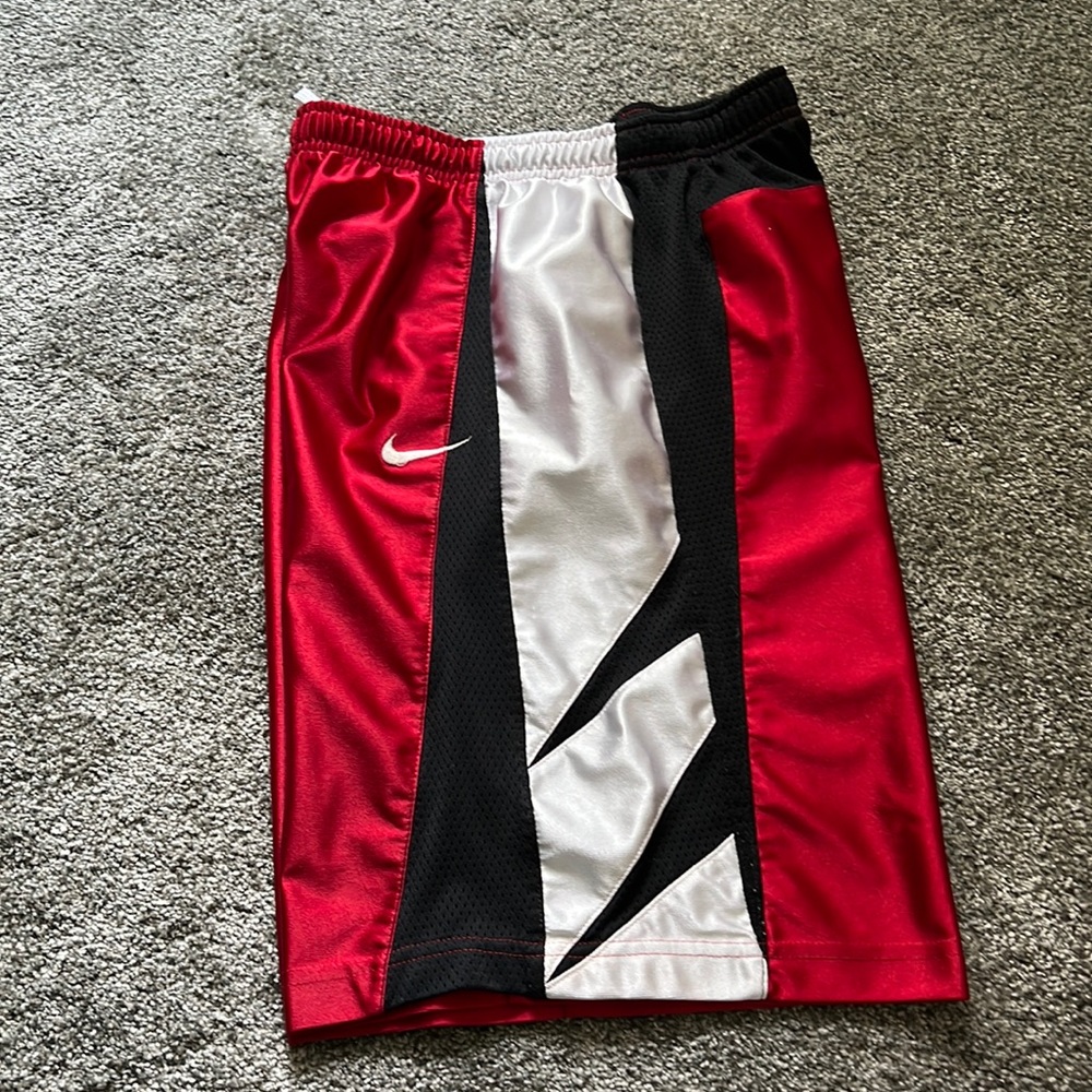 Boy’s red, white and black Nike shorts in good condition.